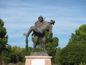 A statue that typifies the humanity of some of the soldiers, a Turk carries a wounded digger back to the ANZAC trench