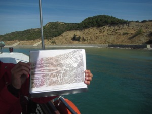 The guide with a photo of the landings holding up over the same spot